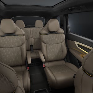 A front view of the interior, focusing on the three rows of seats in the Audi Q9.