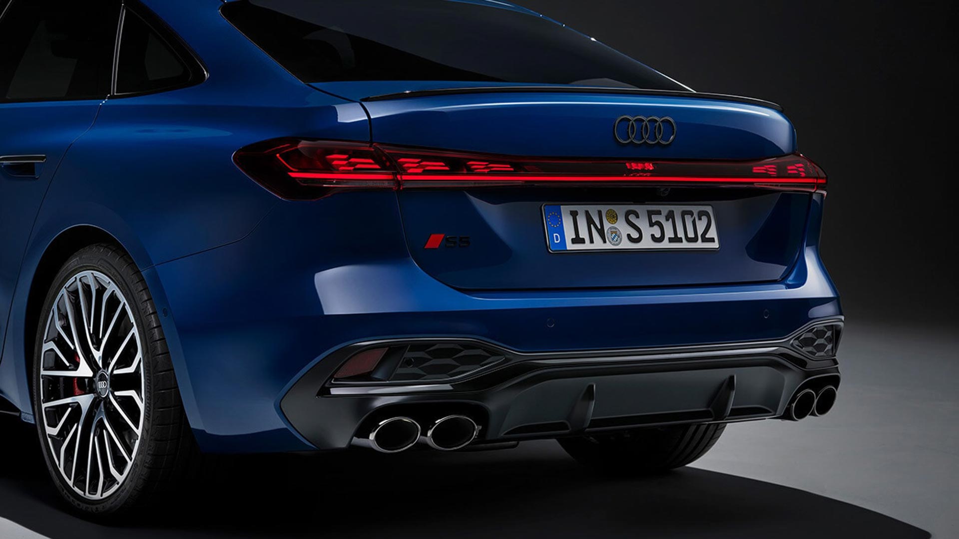 Rear view of the Audi A5 from a three-quarter angle.