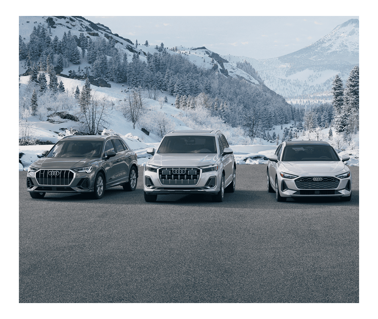 2025 Audi Q3 in Chronos Gray, 2026 Audi Q7 in Satellite Silver, and 2025 Audi A5 in Florett Silver parked in front of snowy mountains