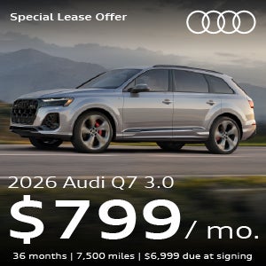 An Audi Q7 SUV parked.