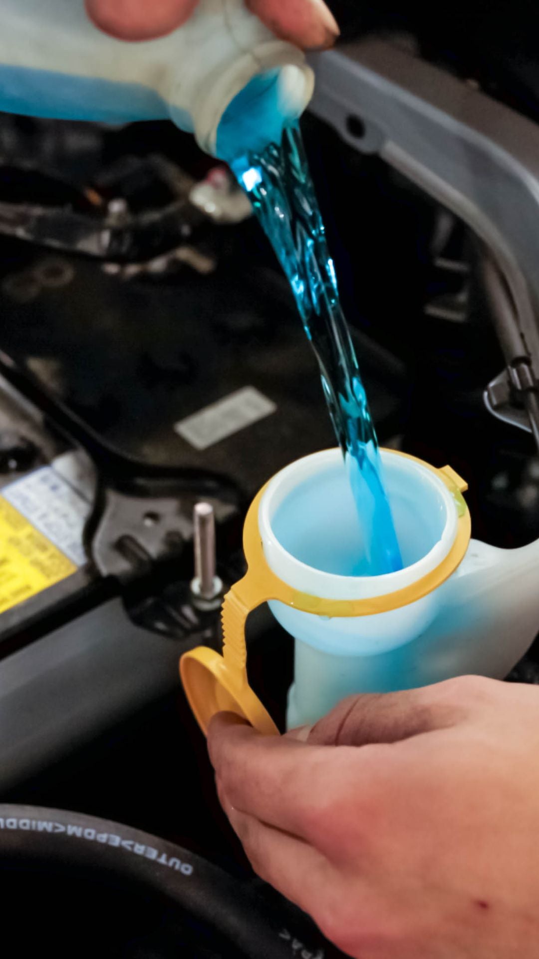 Front profile view of an Audi Q7 accelerating.