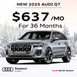 Front view of an Audi Q7 parked.