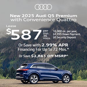 Side view on an Audi Q5 parked.