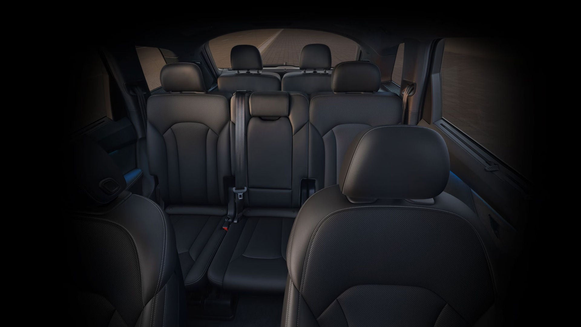 2026 Audi Q7 nterior view of the front seats back showing three rows of seating