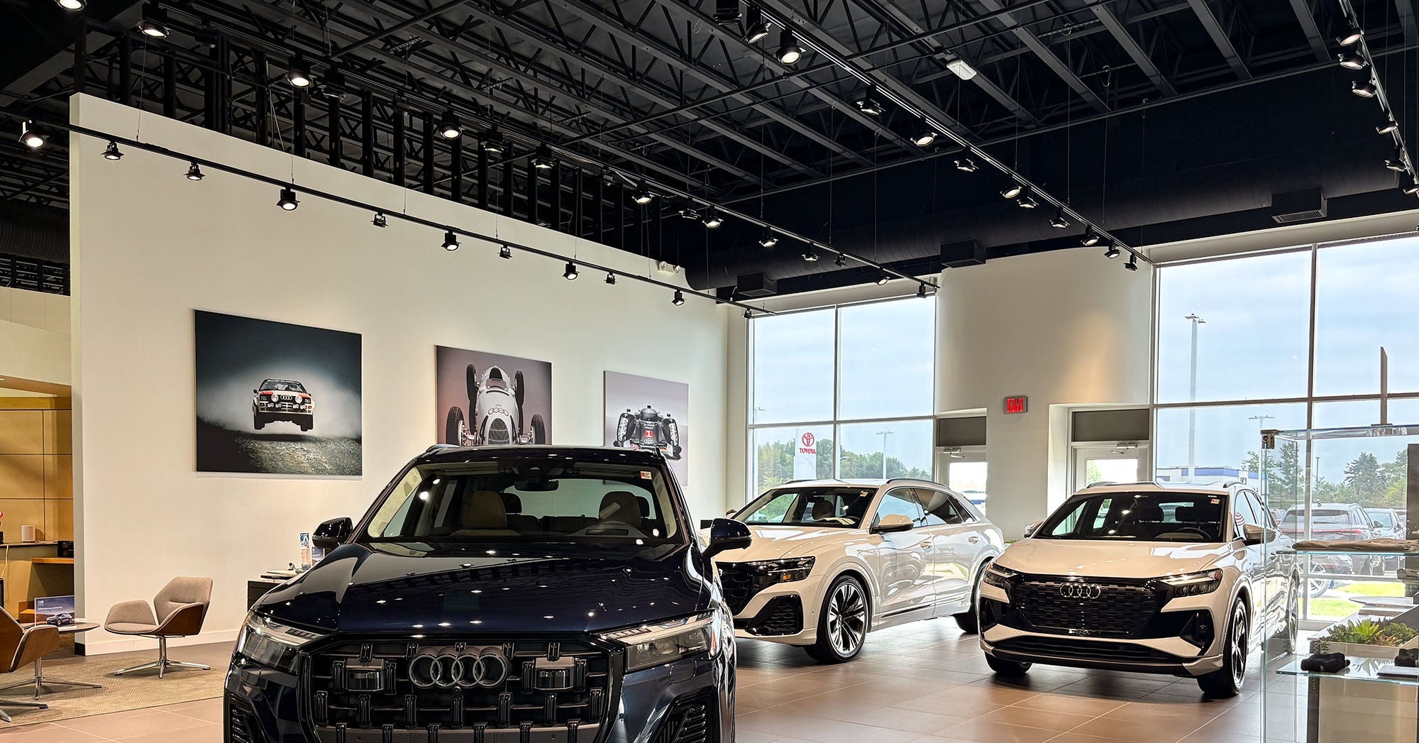 Service technician servicing a tire with another technician.