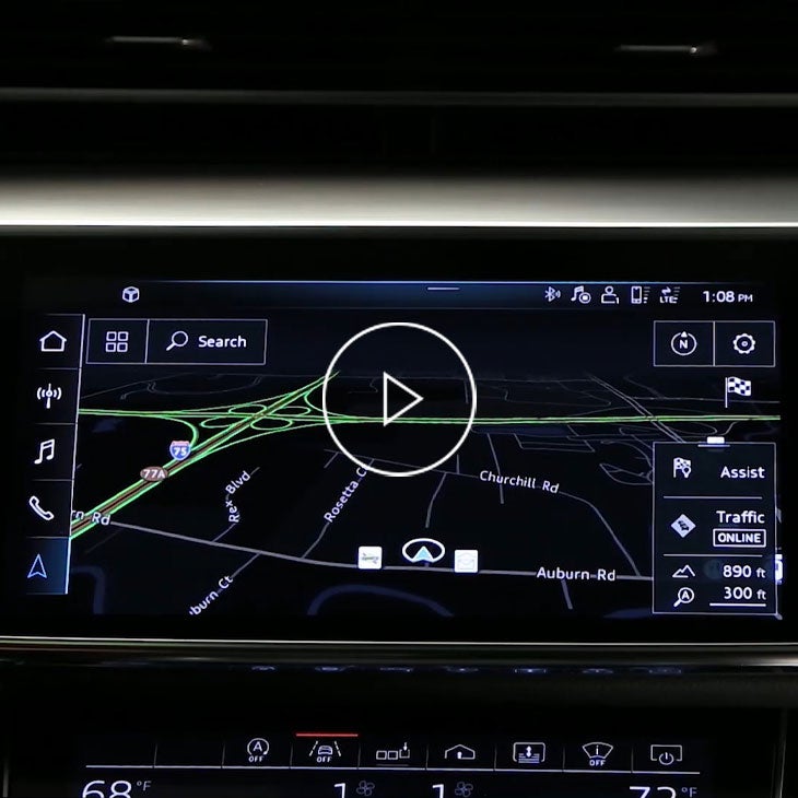  Close-up photo on the MMI screen in an Audi vehicle displaying the navigation feature.