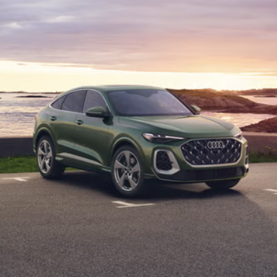 2026 Audi Q5 SUV parking outdoor with sunset in background