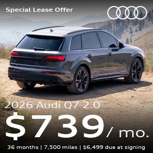 An Audi Q7 SUV parked.
