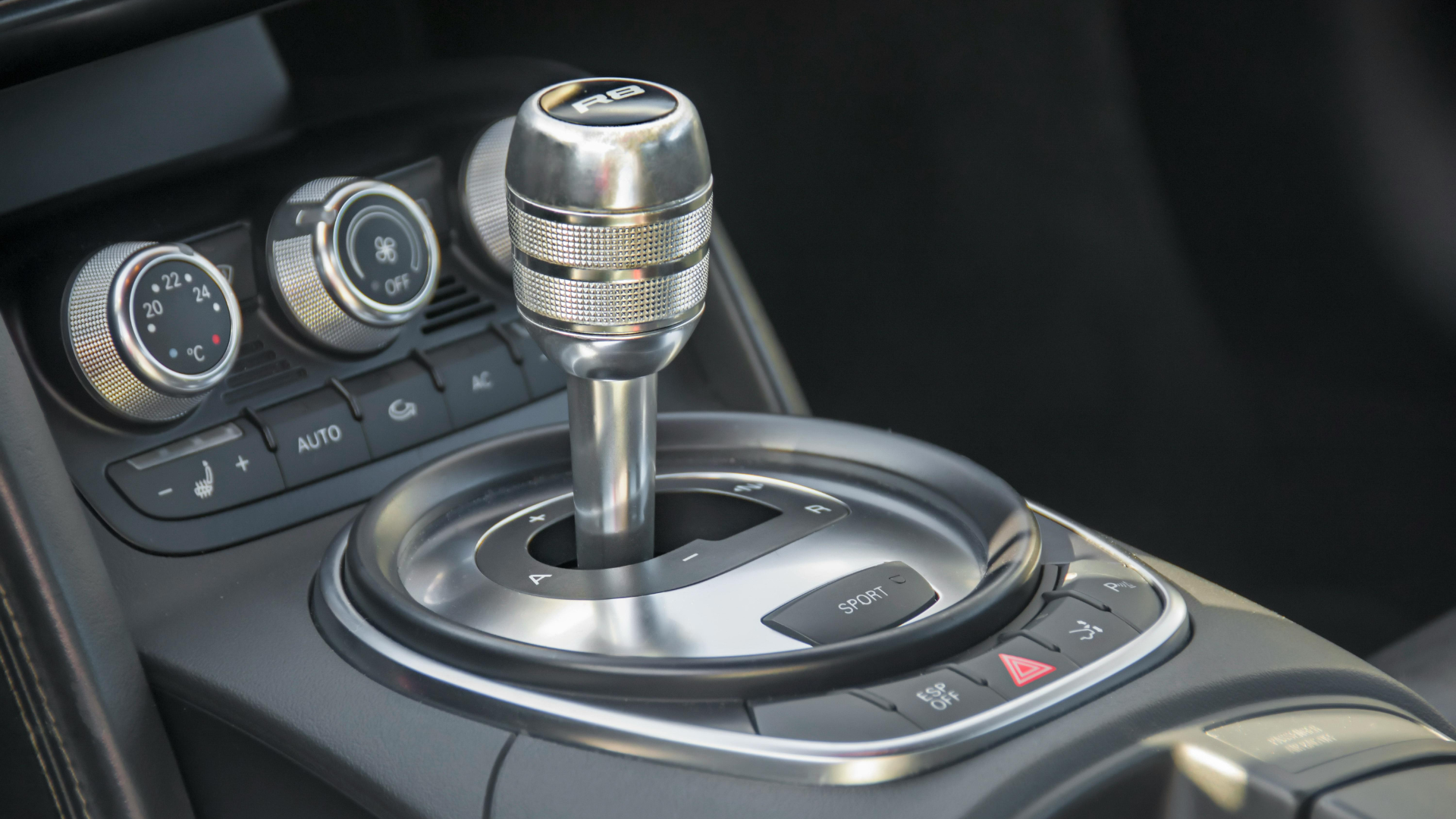 Left profile view of an Audi q8 vehicle parked.