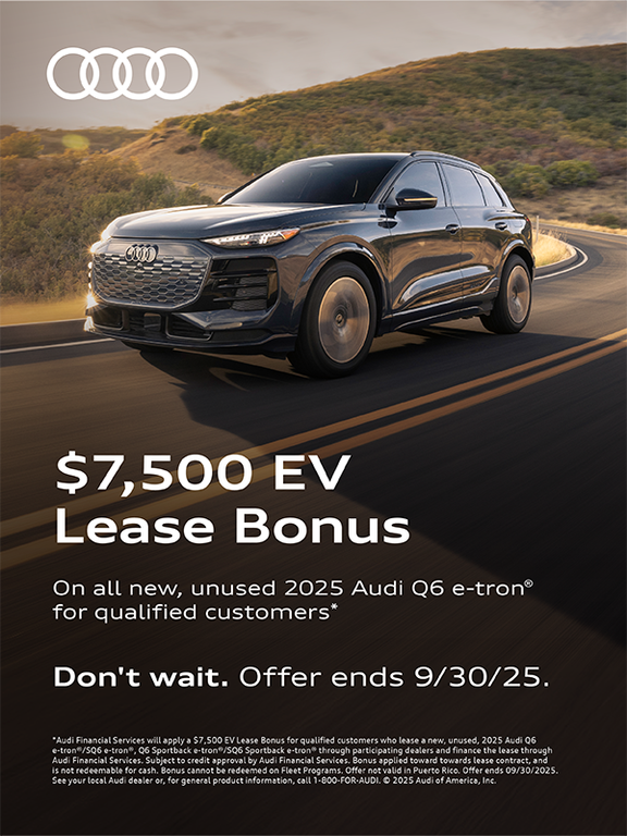 Audi Q6 etron side profile driving