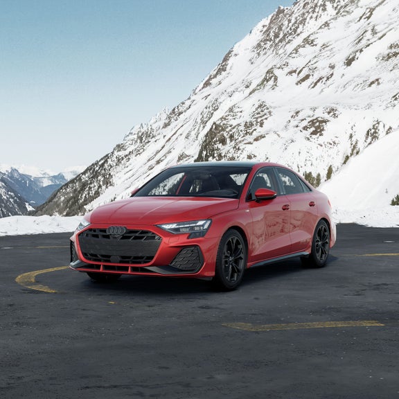 Front three-quarter front view of the Audi A3 parked.