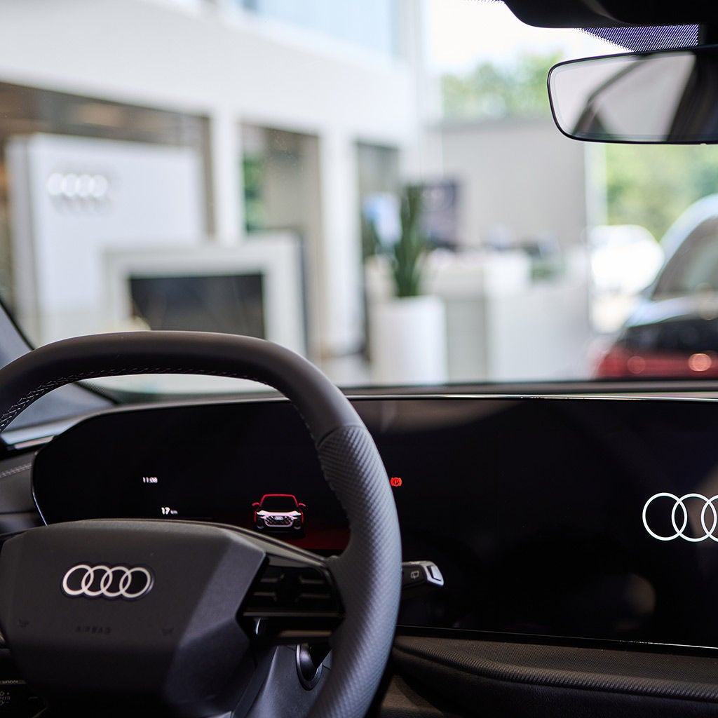 Interior of an Audi vehicle from the driver seat view.