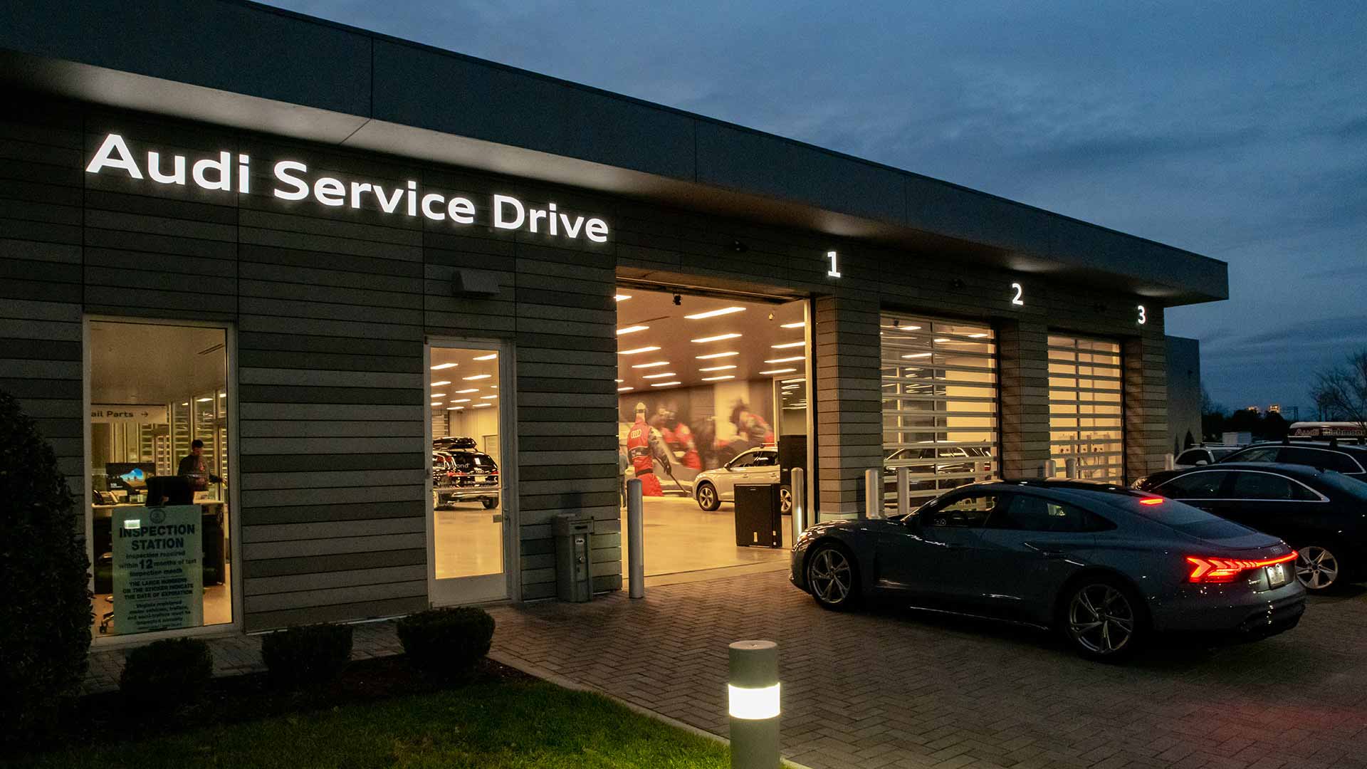 Audi Service Drive building at night