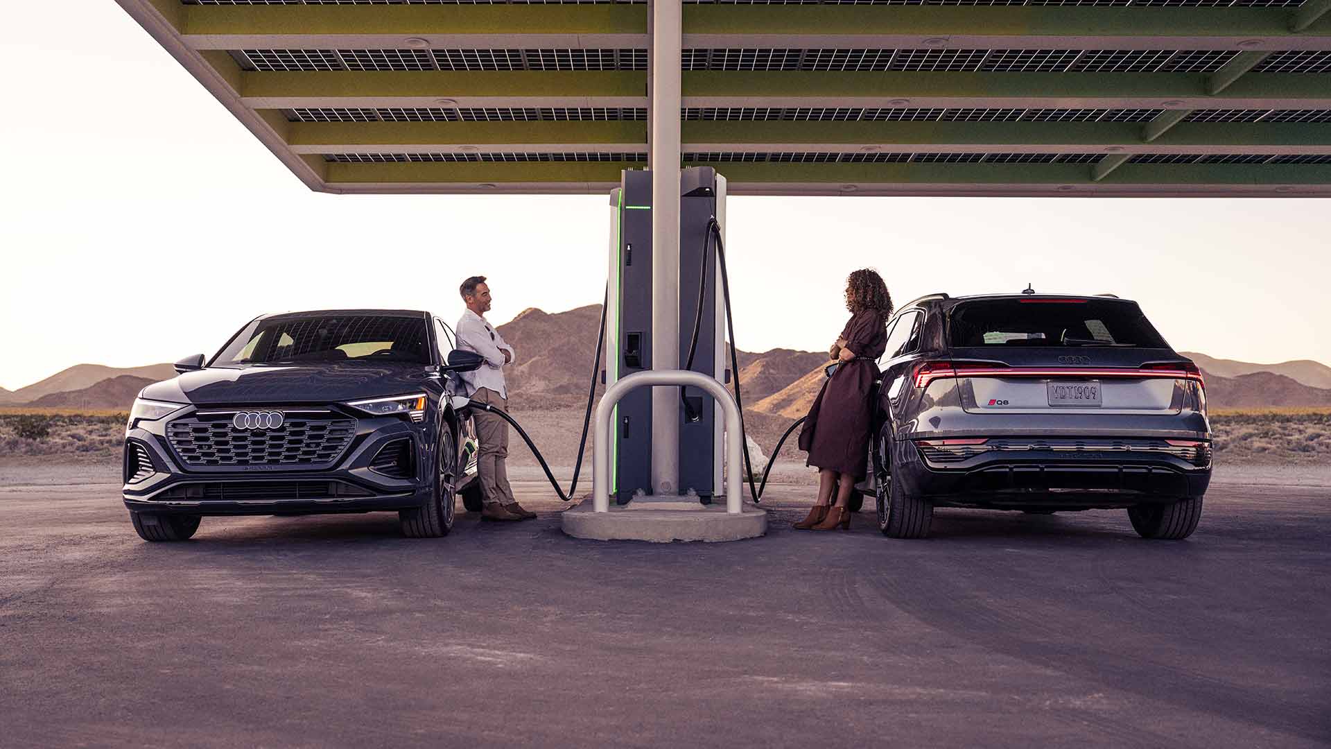 Audi EVs charging at a station