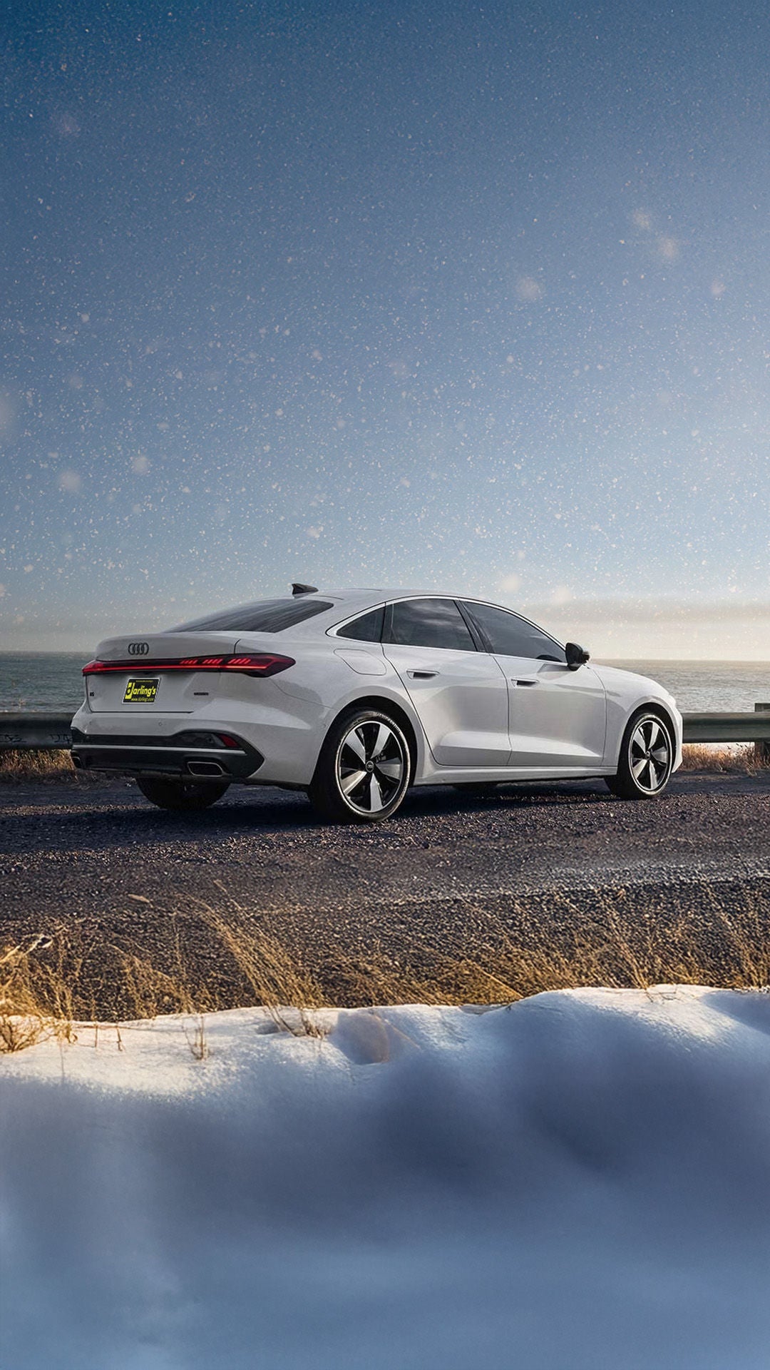 Audi Q7 driving through mountain road in Maine