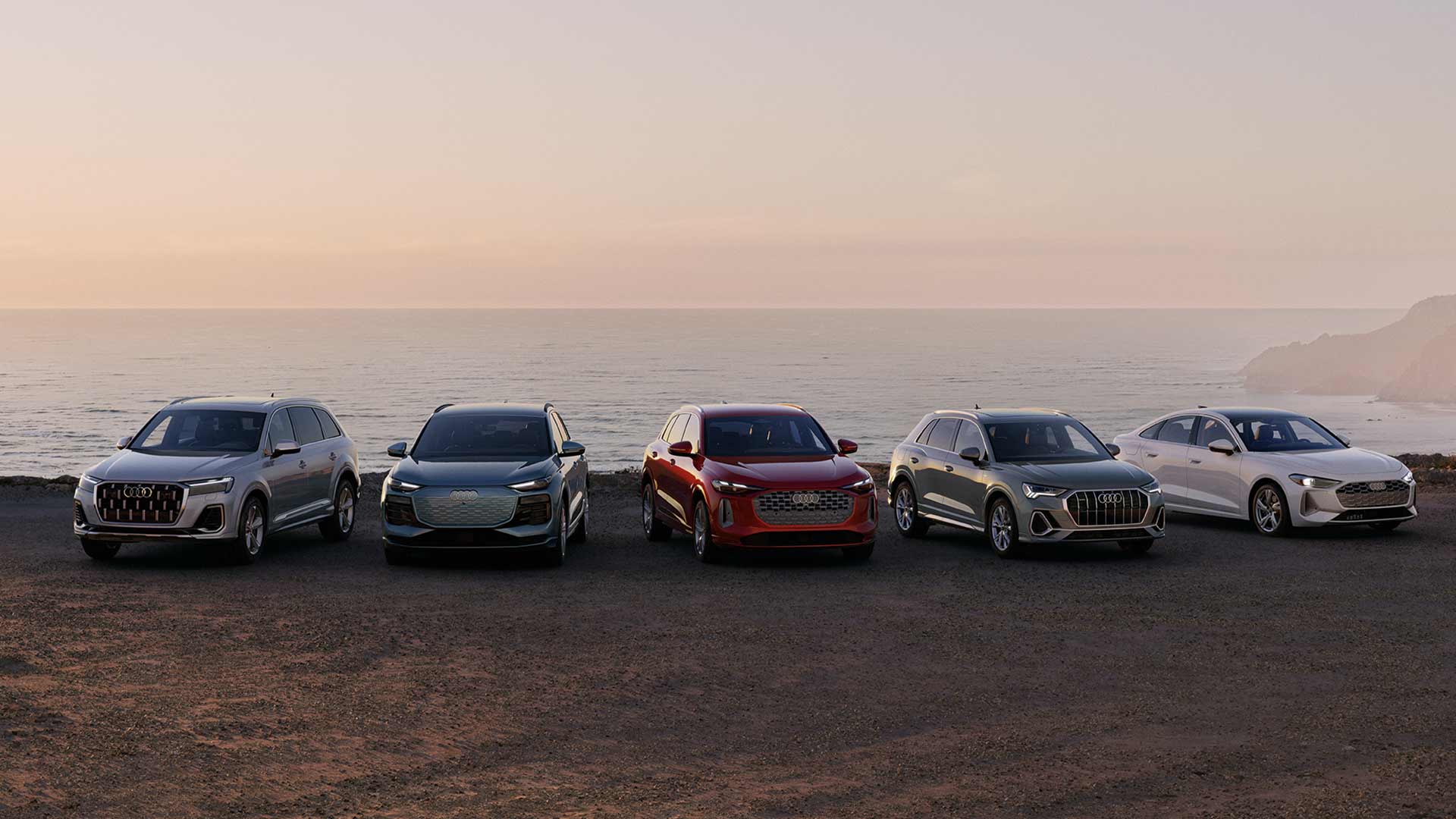 Audi 2025 Audi Q6 e-tron left profile driving.