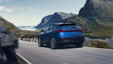 Three-quarter rear view of the Audi SQ5 Sportback accelerating.