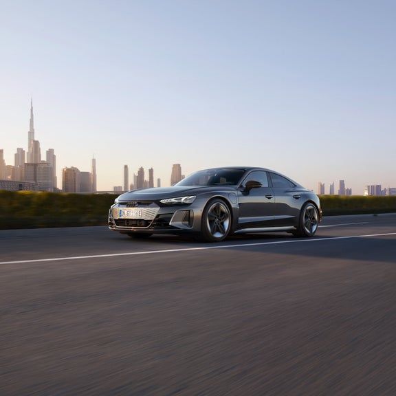 Three-quarter front view of the Audi RS e-tron accelerating.