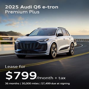 front facing 2025 Audi Q6 e-tron driving