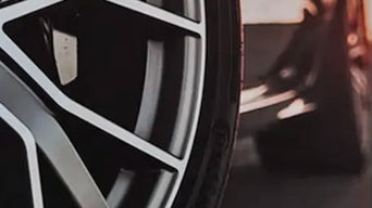 Close-up of a tire that is turned.