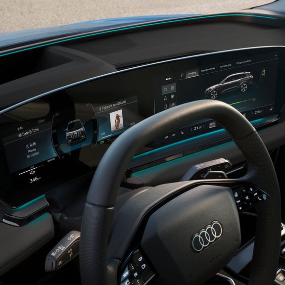 Close-up on the Audi virtual cockpit plus and steering wheel in the Audi Q6 e-tron.