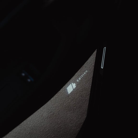 Close-up on the Maple Leaf Edition puddle lights feature on the Audi SQ8.