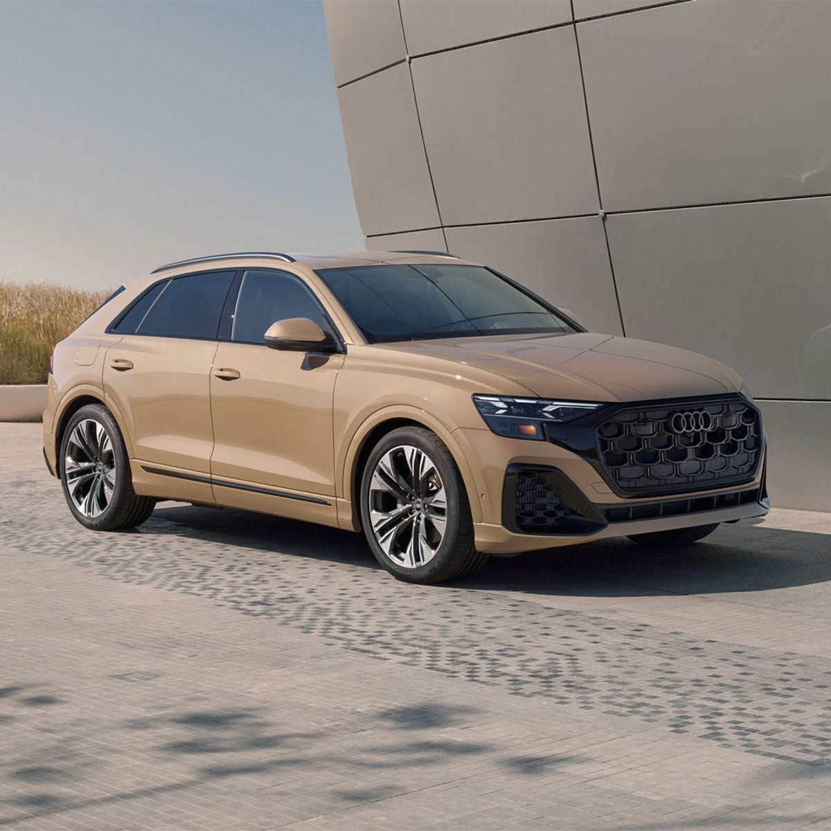 Three quarter front view of the Audi Q8. 