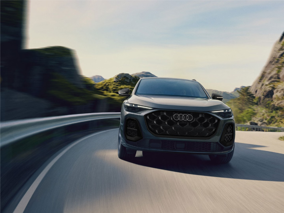 Driving shot of the Audi Q5 in grey