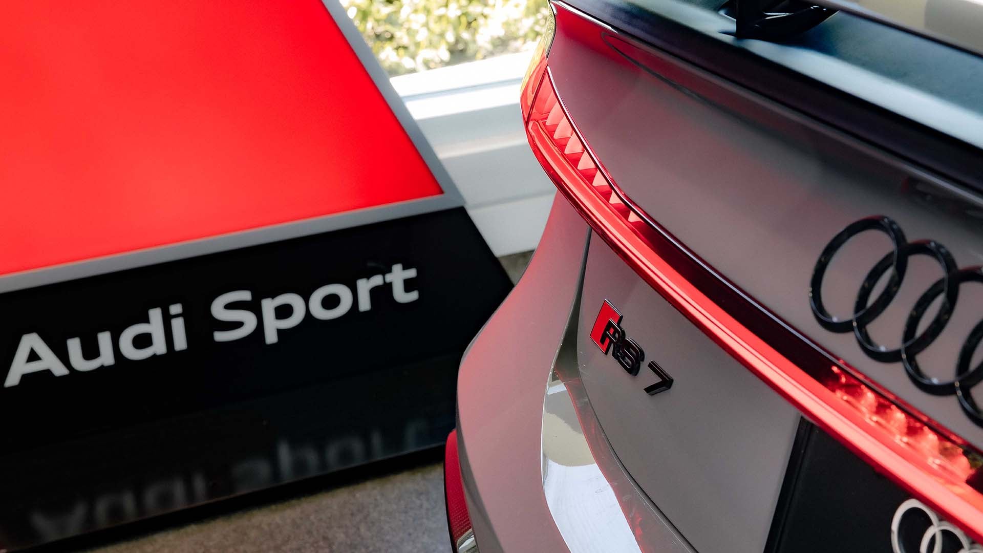 Rear view of an Audi RS 7 parked.