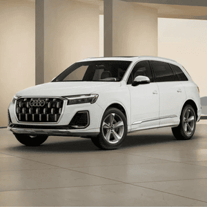 Side view of an Audi Q7 parked.