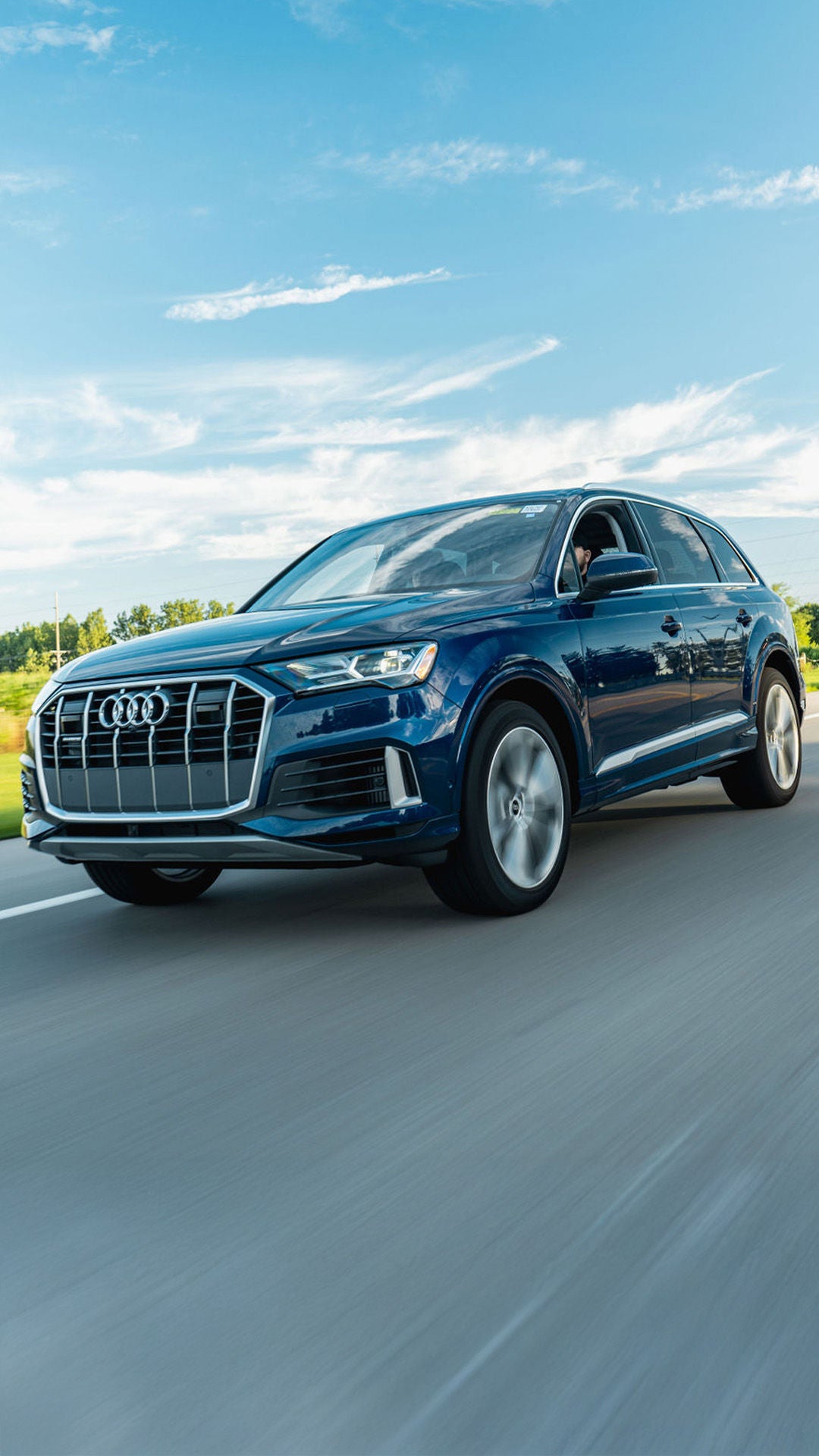 Right profile view of an Audi Q8 e-tron parked.