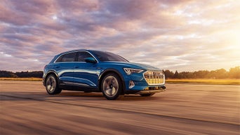 Three-quarter side profile of an Audi e-tron.