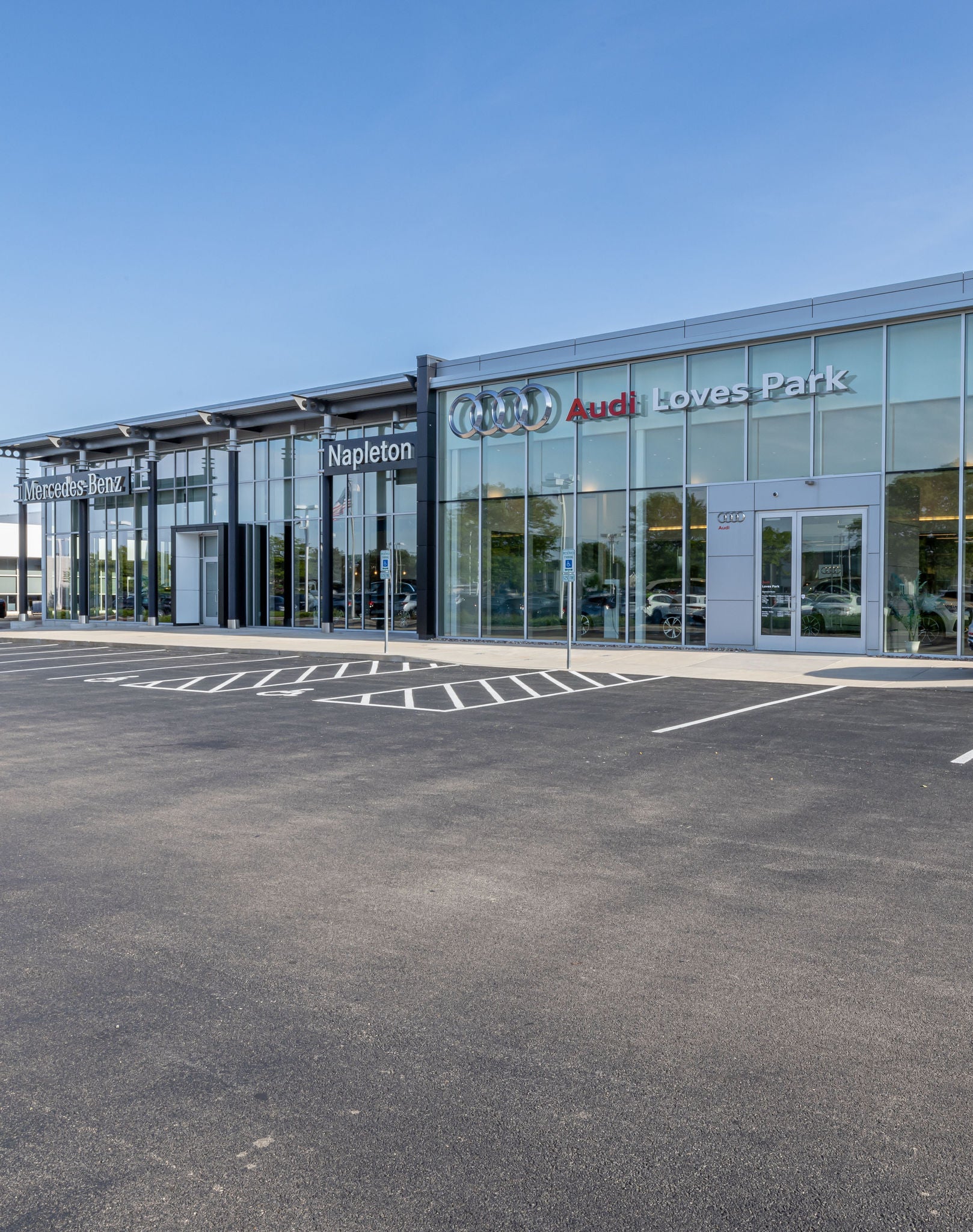 Left side profile view of an Audi S6 parked.