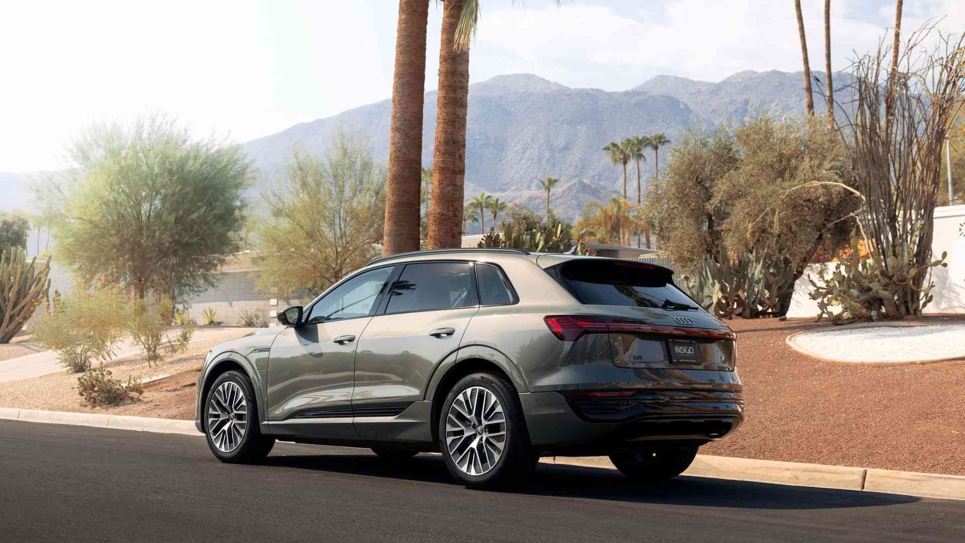 Three quarter view of an Audi Q8 e-tron vehicle parked.