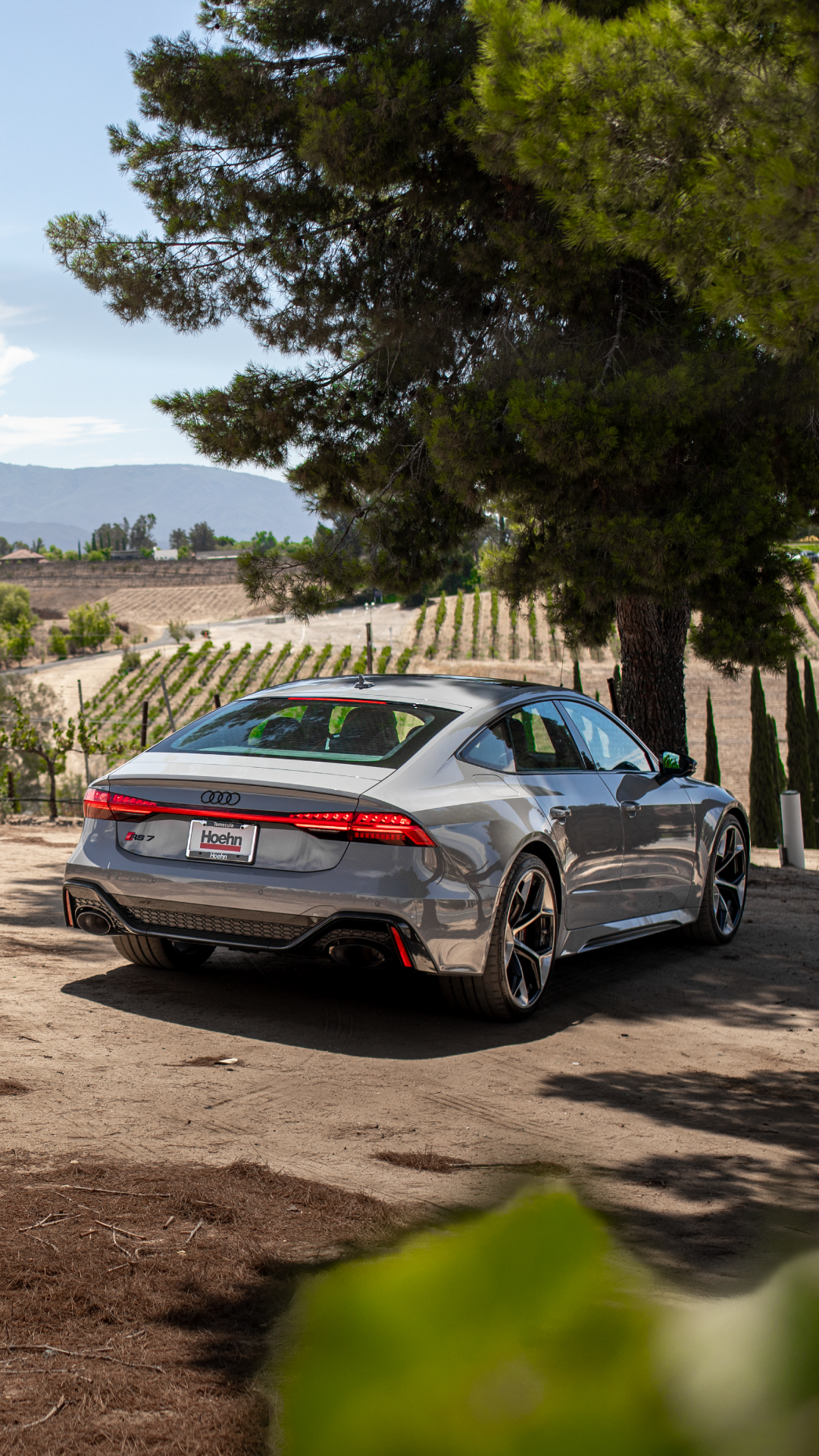 Profile view of an Audi vehicle parked.