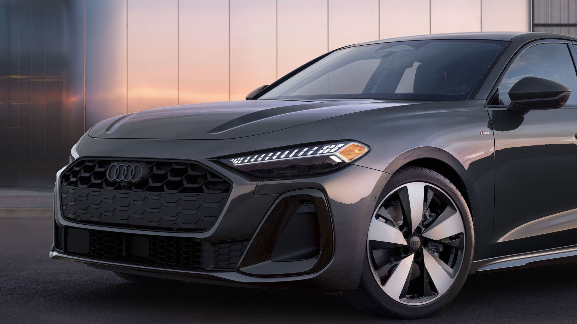 2026 Audi A5 front grille and headlights, low angle.