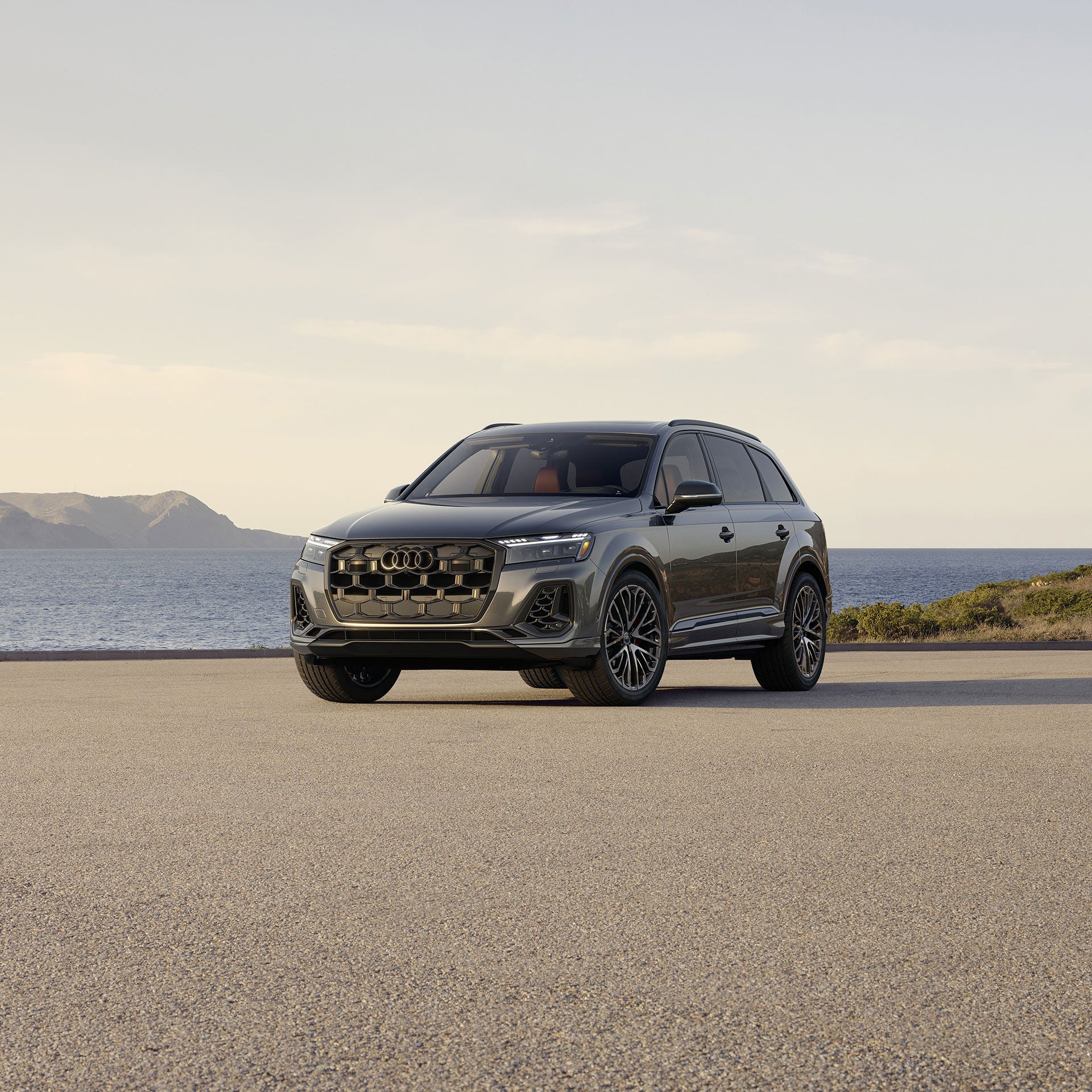 Rear profile of an Audi A5 parked. 