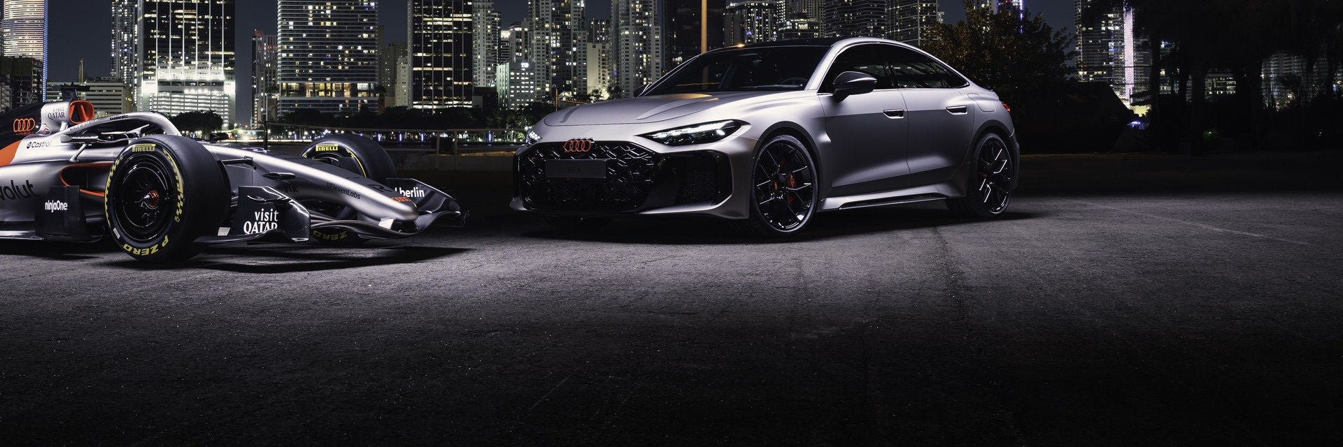 Audi RS5 hot lap car and RS5 against the Miami skyline