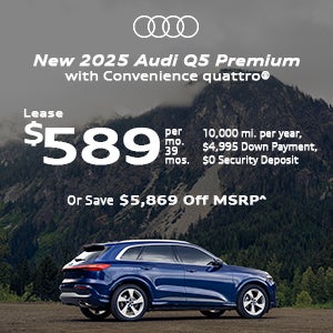 Side view on an Audi Q5 parked.