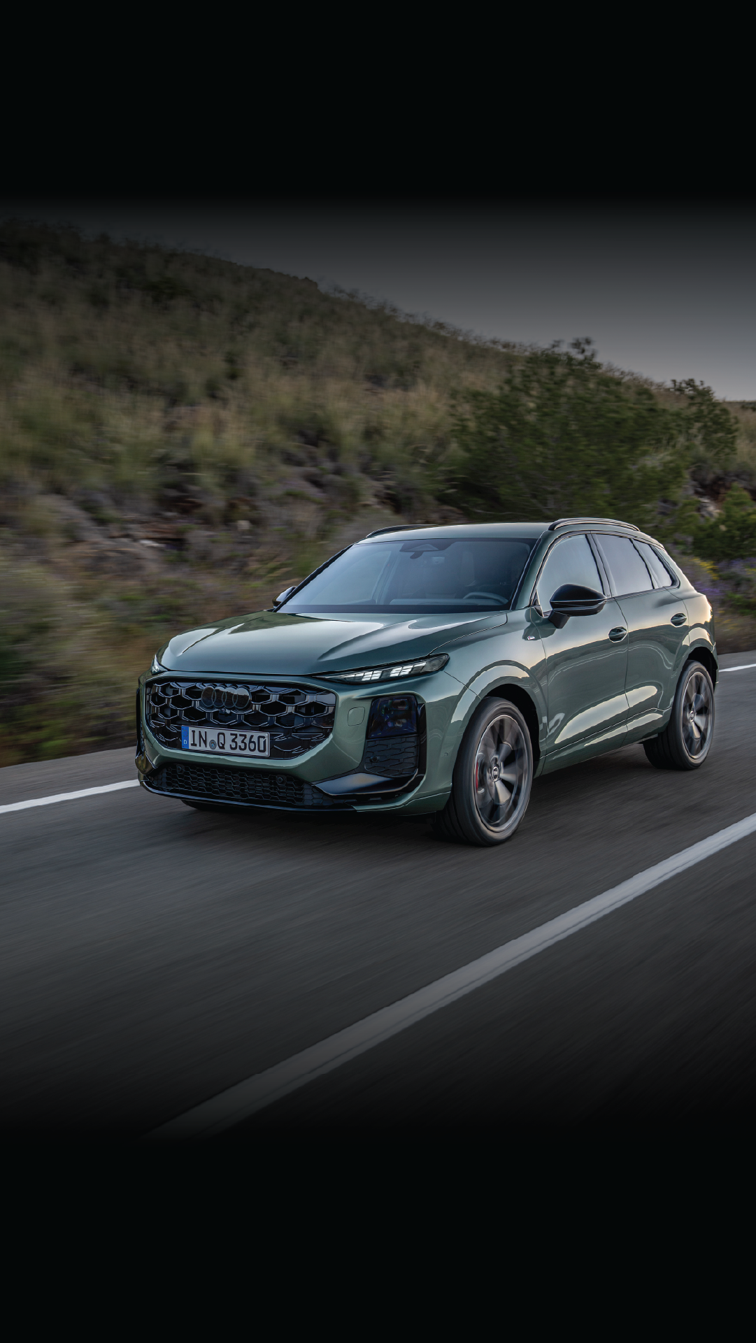 Driving shot of 2026 Audi Q3 on the road