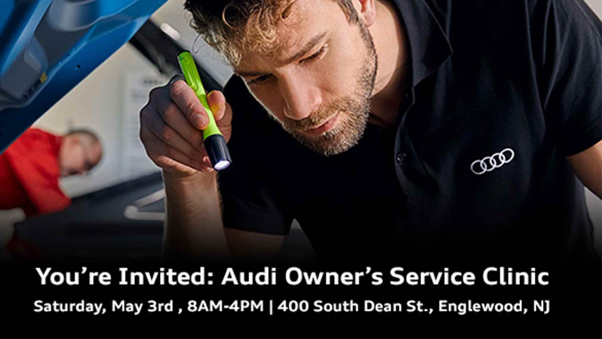 Service technician inspecting a vehicle