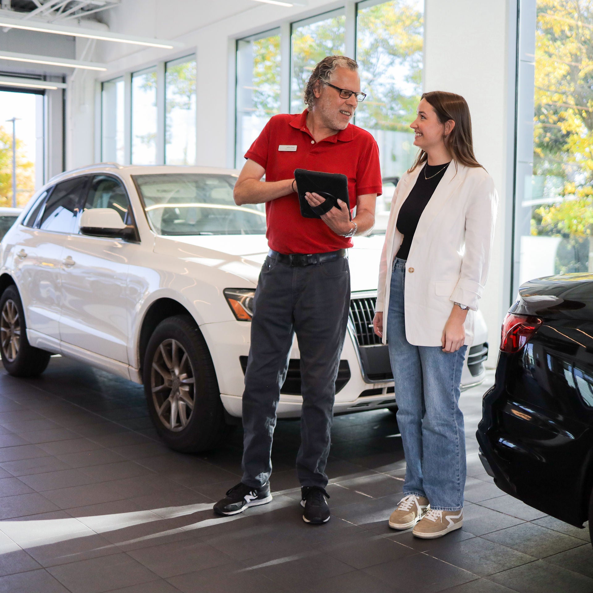 Rear profile view of an Audi Q5 parked.