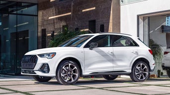 Side view of a 2025 Audi Q3 parked.