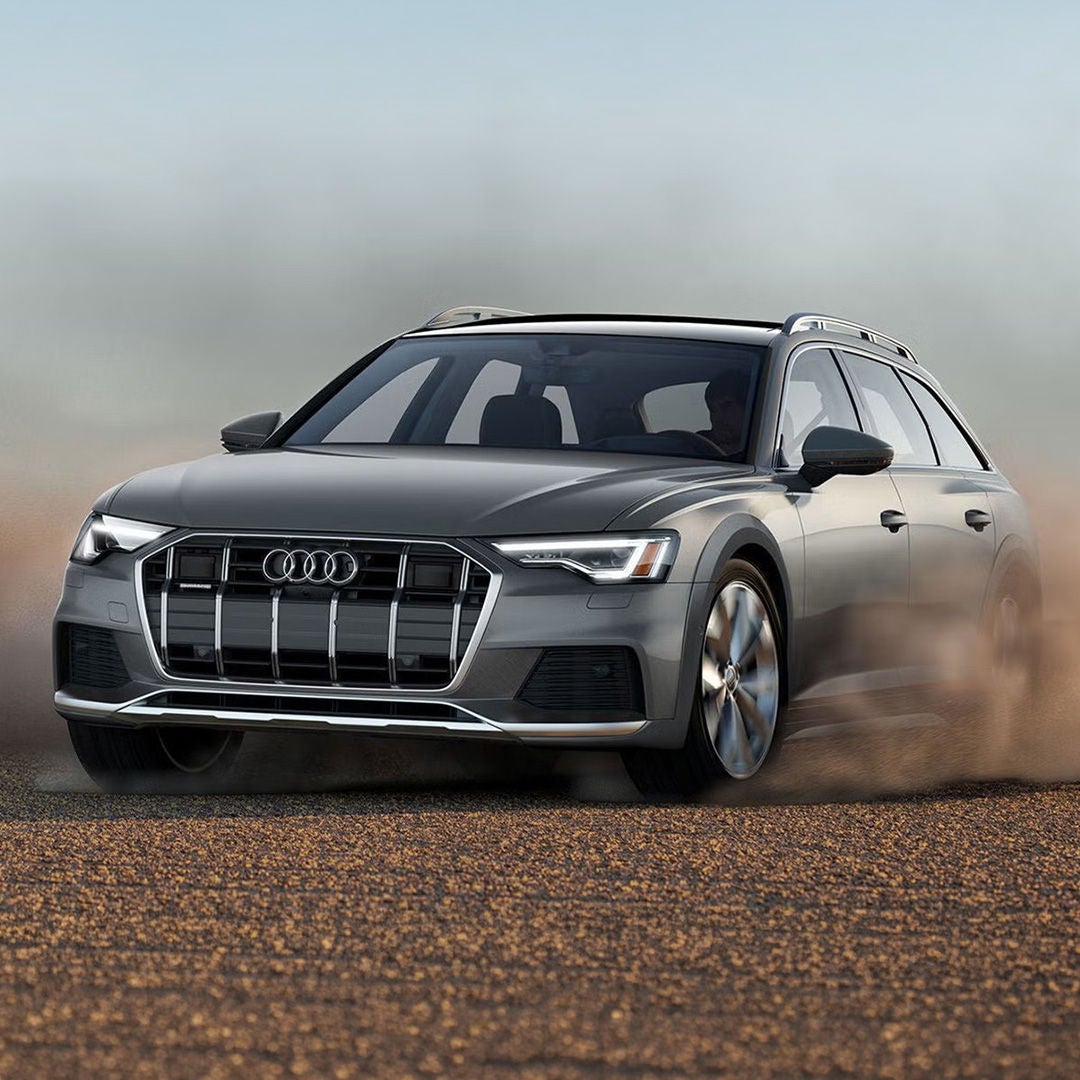 Three quarter view of an Audi A6 Allroad in motion.