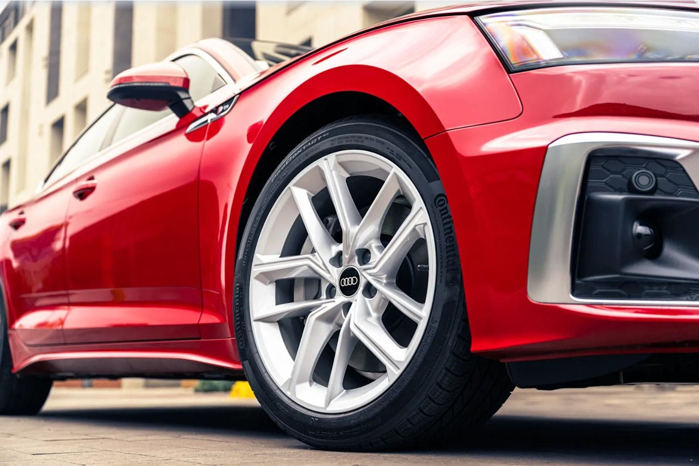 Left profile view of an Audi Q7 e-tron on the highway