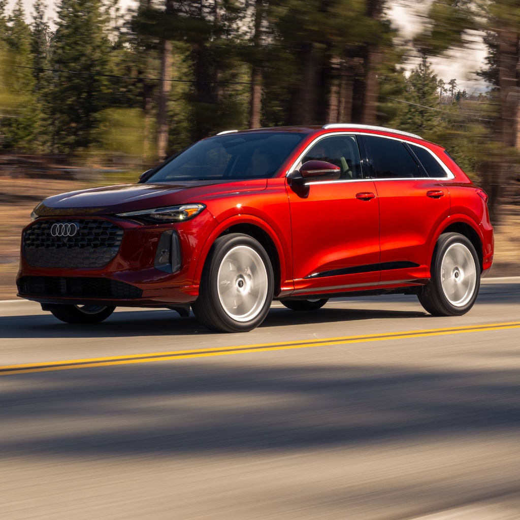 Front profile view of an Audi Q5 accelerating.