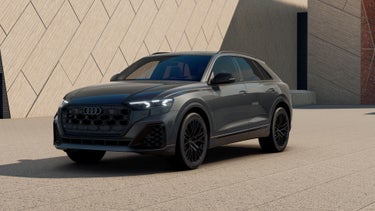 Three-quarter front view of the Audi SQ8 parked.