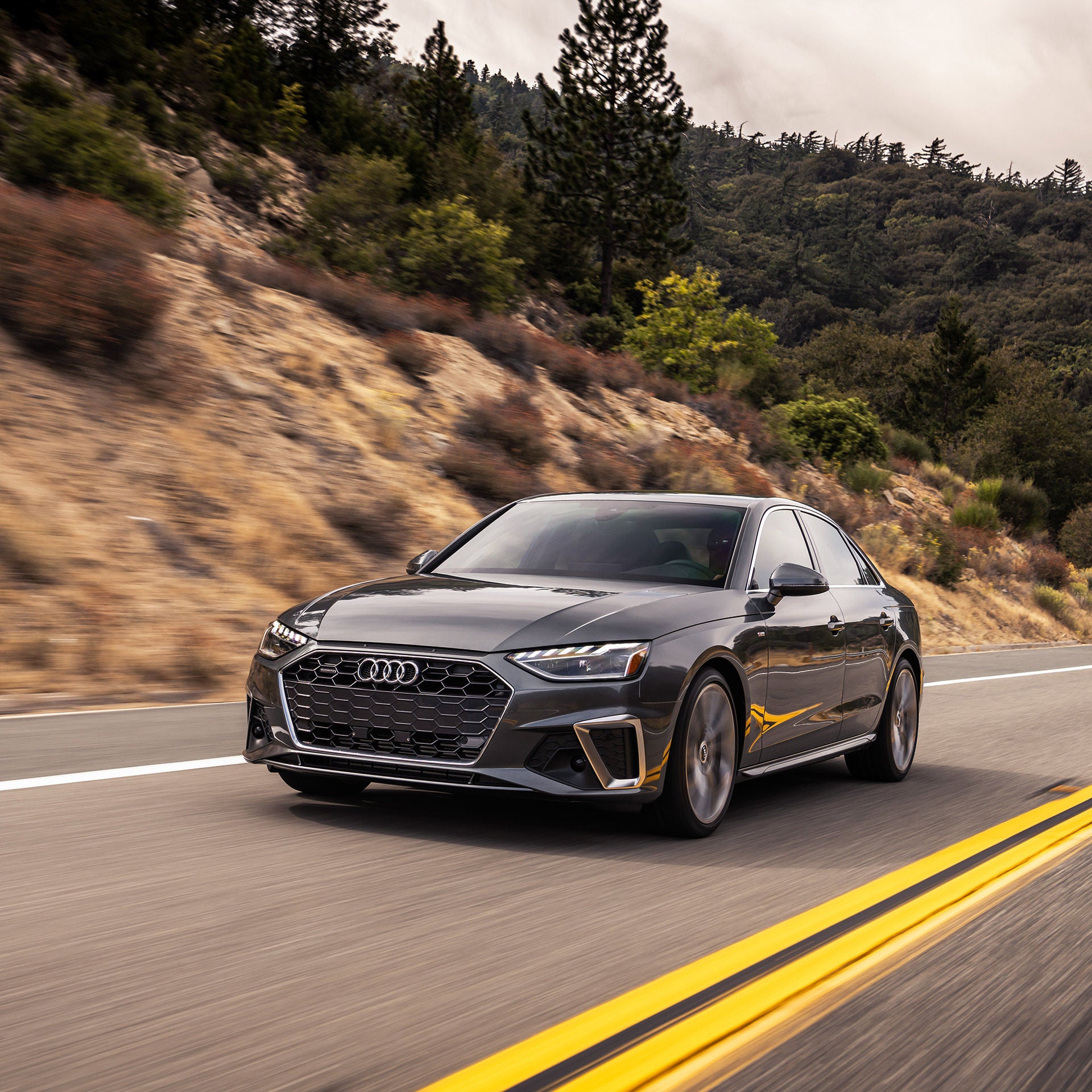 Three quarter front view of the Audi Q5 accelerating.
