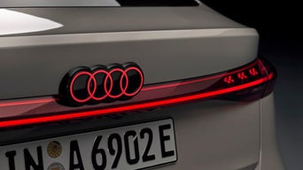 Close-up view of the Audi logo at the back of the 2026 Audi A6 e-tron.