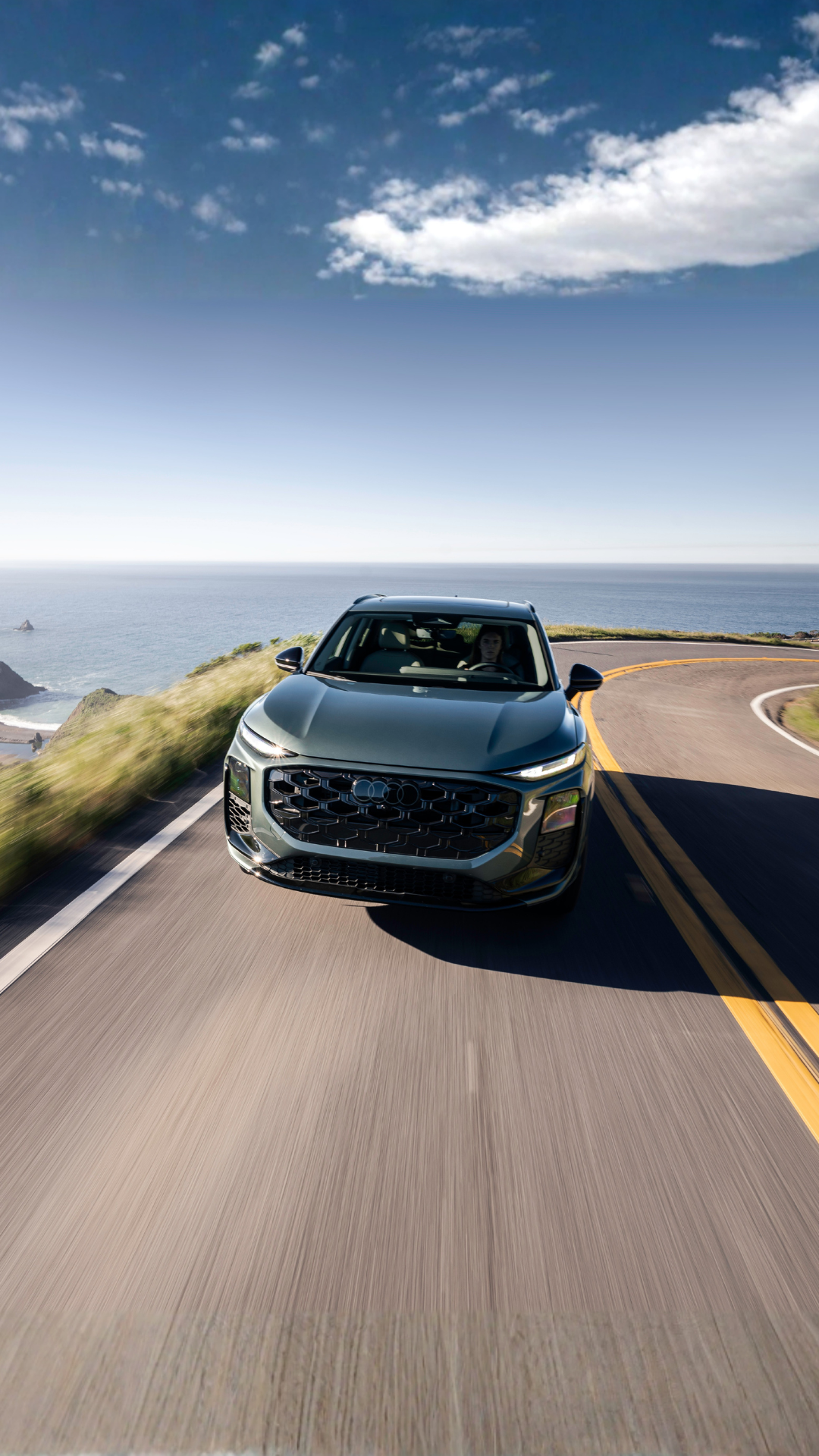 Front profile view of an Audi Q3 drive on a road